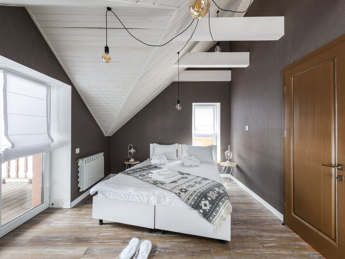 Terrace room: white walls, long windows, the terrace beyond