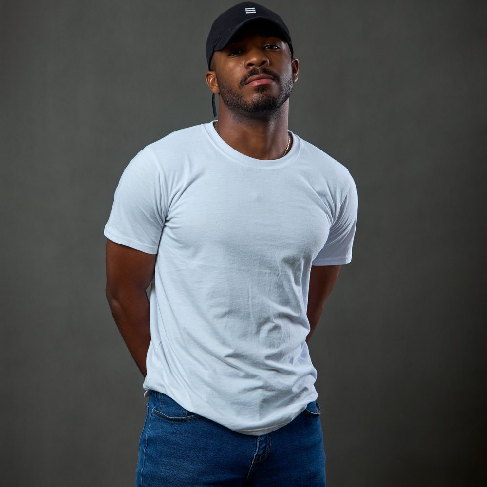 The six-panel cap and the heavy tee