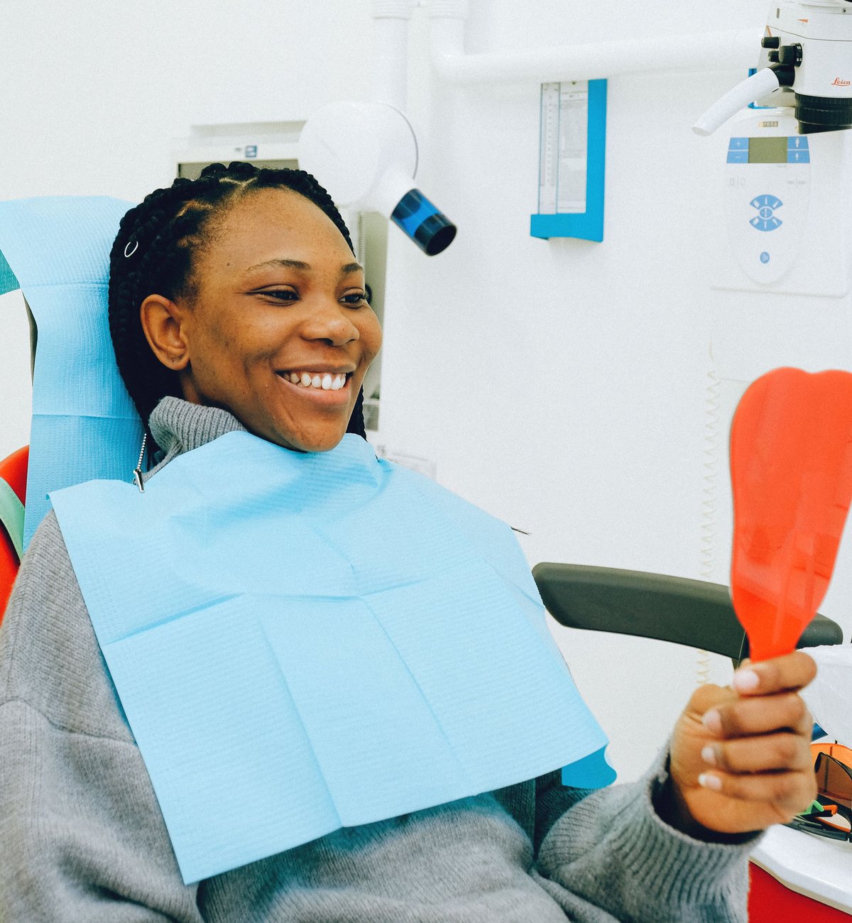A patient in the chair at the end of a check-up